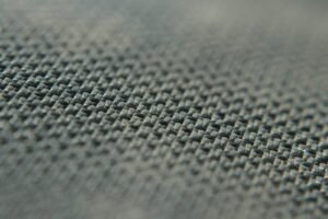 A close up view of a gray fabric