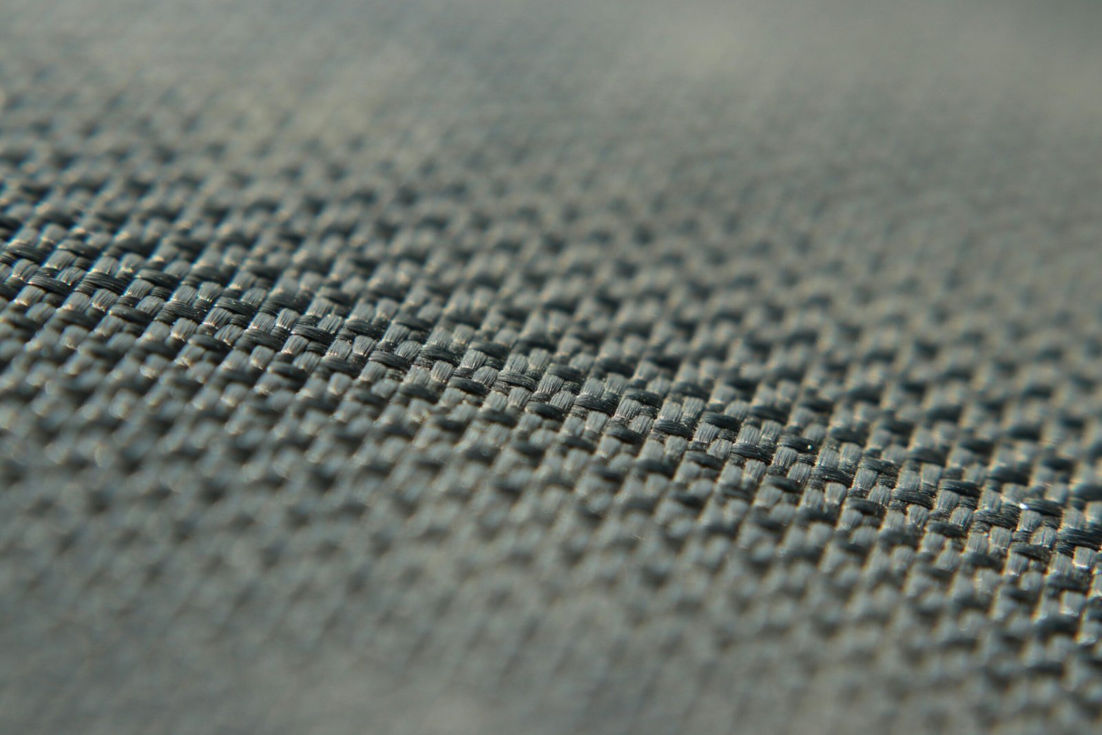A close up view of a gray fabric